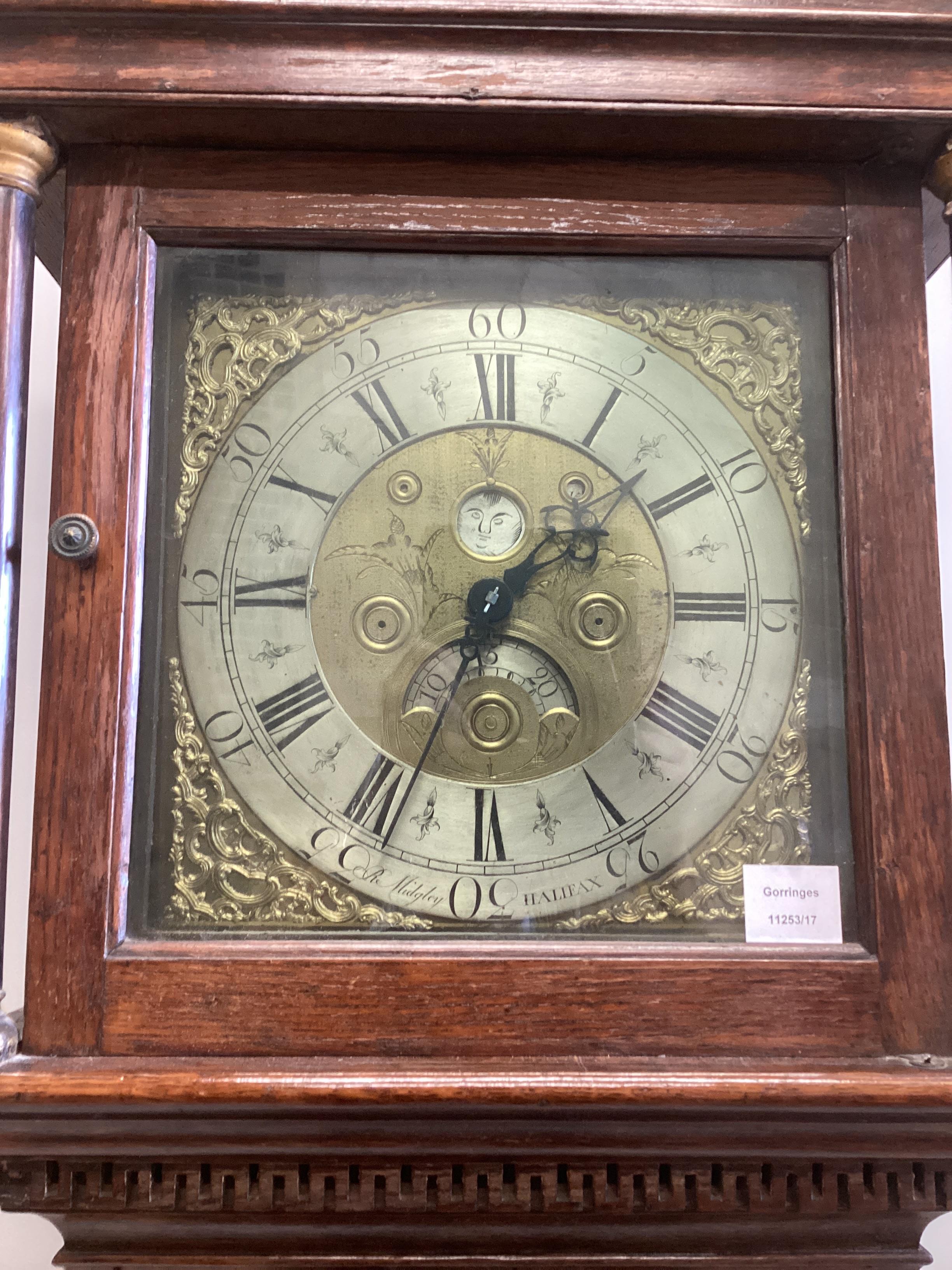 A George III oak thirty hour longcase clock, the 12in. dial marked R. Midgley of Halifax, height 214cm
